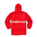 Veste rouge à capuche Essentials Graphic Coach